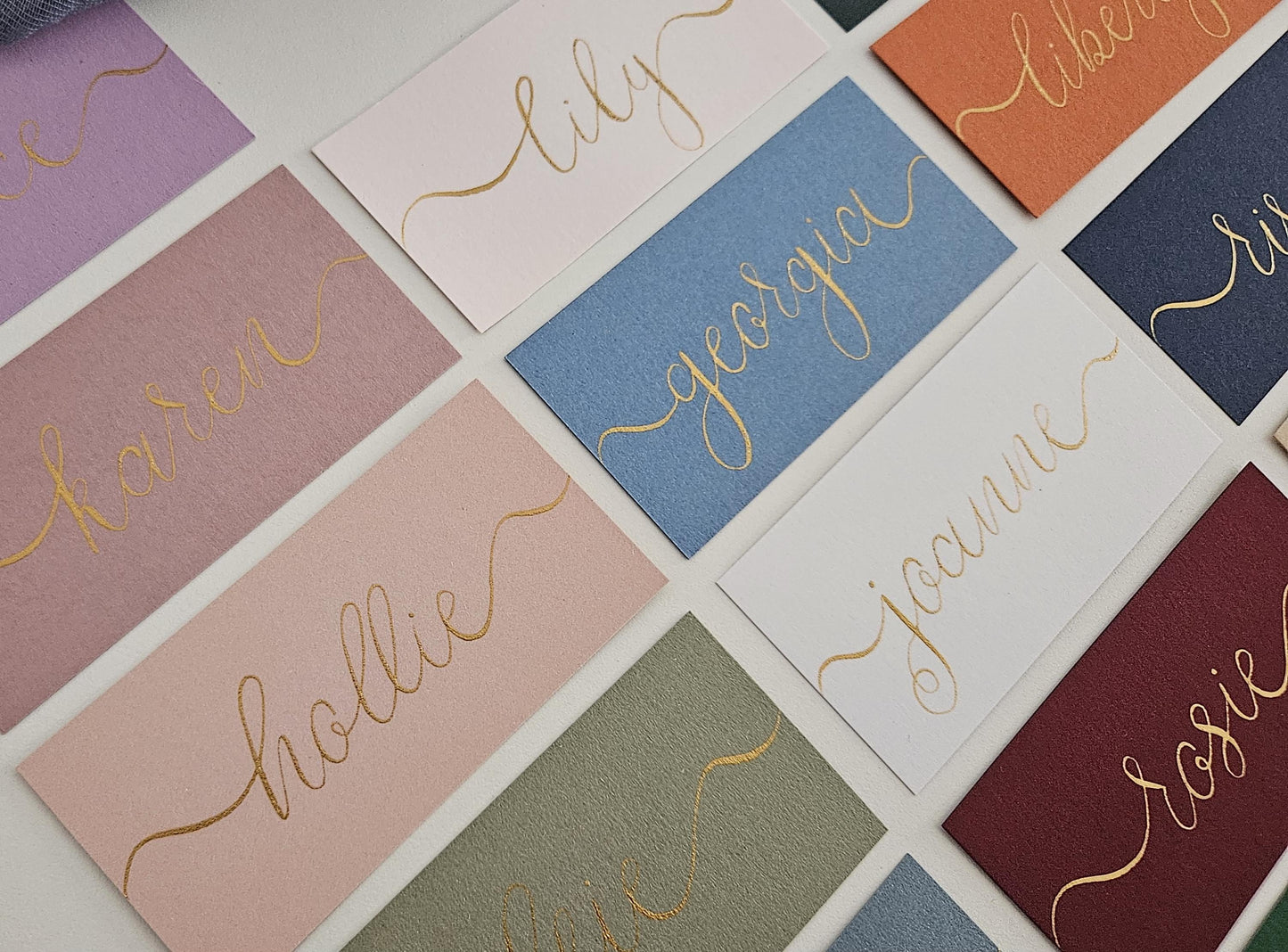 Handwritten Coloured Flat Place Names | Gold, Blush Pink, Blue, Green Wedding Place Cards | Gold Ink Calligraphy | Seating Plan | Wedding