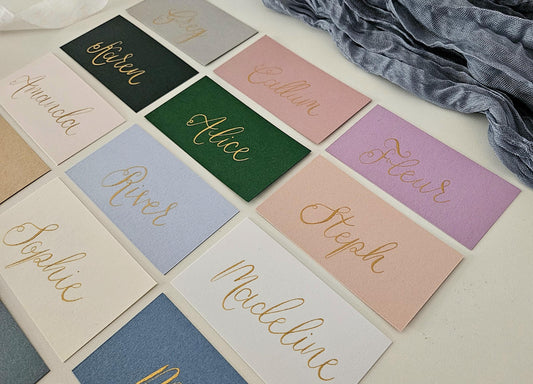 Handwritten Coloured Flat Place Names | Gold, Blush Pink, Blue, Green Wedding Place Cards | Gold Ink Calligraphy | Seating Plan | Wedding